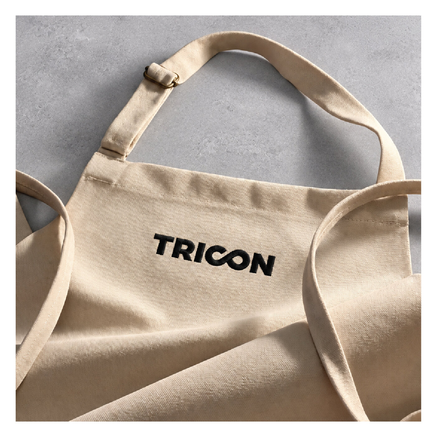 Ποδιά εργασίας με το λογότυπο TRICON